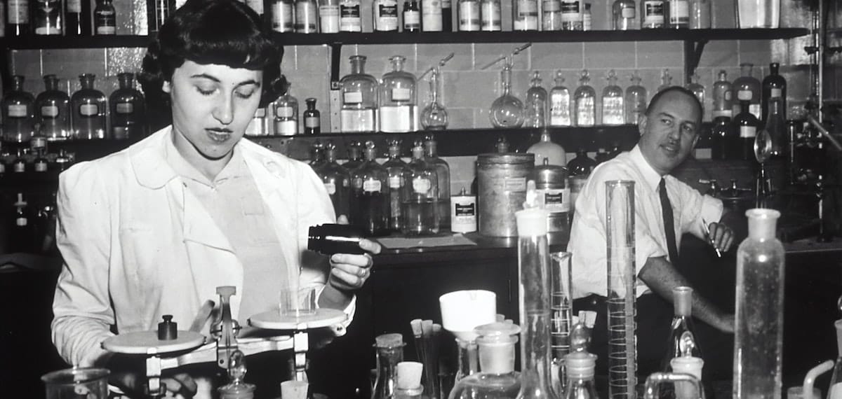 Dr. Jonathan Hartwell (right) and his assistant Sylvy R. Levy Kornberg conduct some of the earliest chemotherapy tests at the National Cancer Institute, about 1950